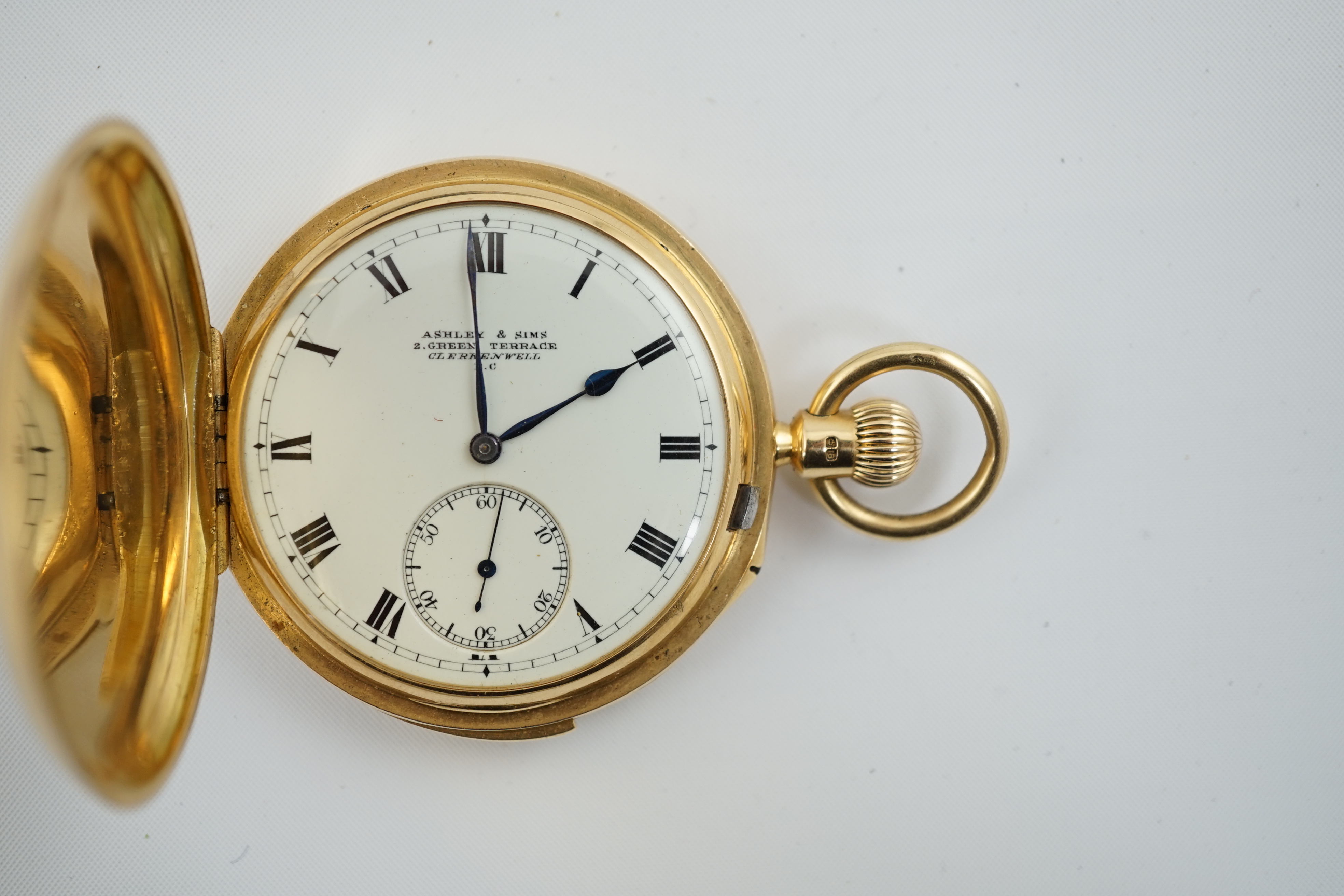 A George V 18ct gold hunter minute repeating lever pocket watch, by Ashley & Sims of Clerkenwell